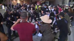 Downtown LA declared ‘unlawful assembly’; Newsom to sue over National Guard deployment – USA Today