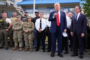Updates: Trump says he will send the National Guard to ‘hellhole’ Chicago – Al Jazeera