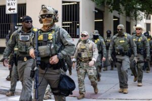Illinois governor says troops could be deployed to Chicago as immigration agents patrol downtown – PBS
