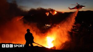How the Los Angeles wildfires affected the sports world, including a postponed game – USA Today
